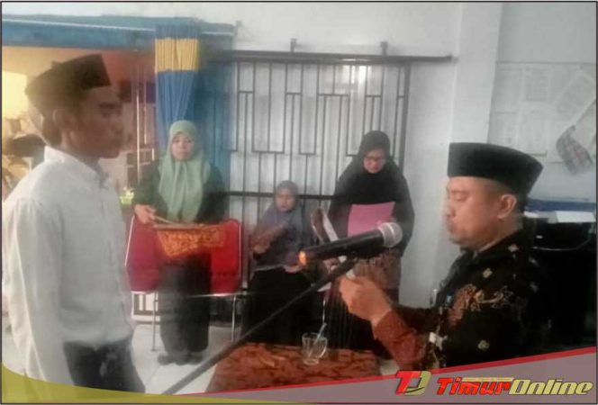 
					Camat Burau Lantik Dua Anggota BPD